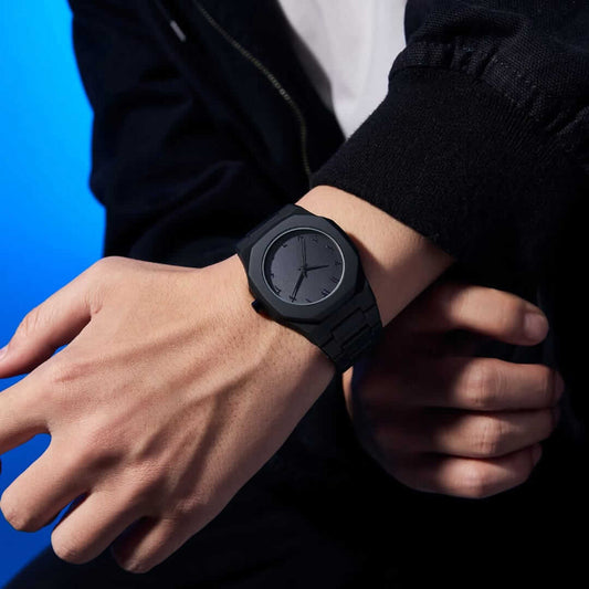 Stealth Arabic Dial Watch worn on wrist, showcasing modern black design and Eastern Arabic Numerals.