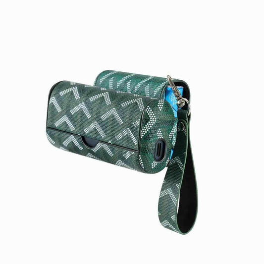 ILUMA Prime leather case featuring a green pattern and detachable wrist strap for stylish protection.